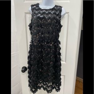 Beautiful dress from Anthropologie . The brand is Blue Taswel.